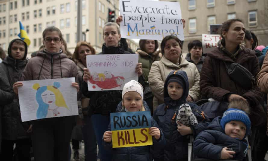 Russia-Ukraine war: 120,000 civilians blocked from leaving besieged city of Mariupol, says Zelenskiy – live 3 Protesters in Warsaw demanded an end to the killing of children in Ukraine.