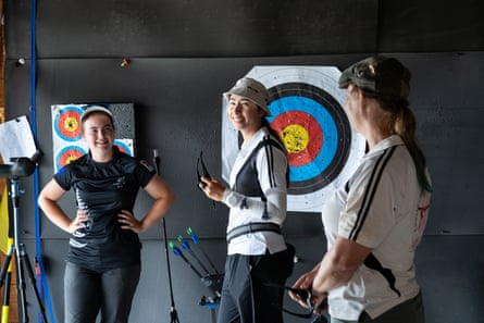 Archers gather in front of a target