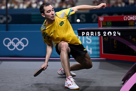 Brazil’s Hugo Calderano returns the ball to Sweden’s Truls Moregard during a match at the Paris Olympics.