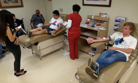 Greg Shafer donates blood at the OneBlood Blood Donation Center in Orlando.