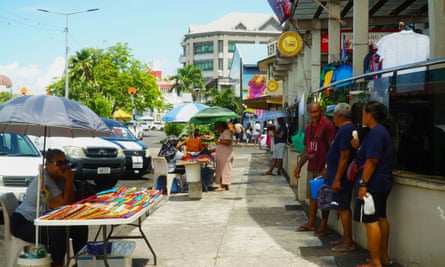 A main street in Apia, the capital of Samoa, which had 6,600 people depart the country in 2021 for seasonal worker programs in Australia and New Zealand.