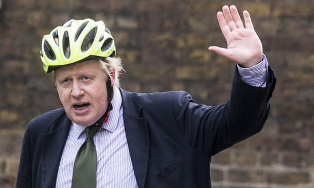 Boris Johnson in a cycling helmet