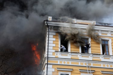 Staff climb out of windows as flames engulf the National Academy of Sciences