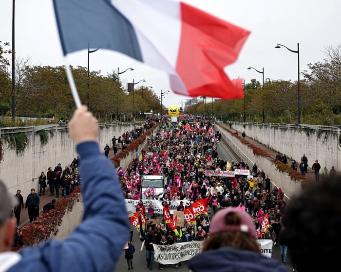 Protests begin in France, as Italian police raid homes in Milan ahead of demonstrations – Europe live