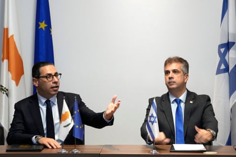 Israeli foreign minister Eli Cohen, right, meets with his Cypriot counterpart Constantinos Kombos in the southern coastal city of Larnaca, Cyprus, on 20 December.