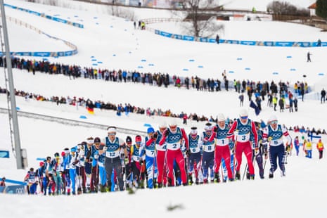 Competitors in action shortly after the start of the Men's 50km Mass Start.