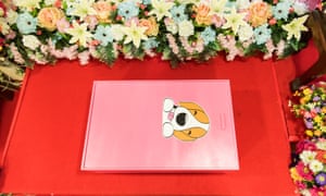A dog casket sits ready for a ceremony at the in Bangkok, Thailand. A combination of walk-ins and appointments sees the facility preside over dozens of ceremonies each week.