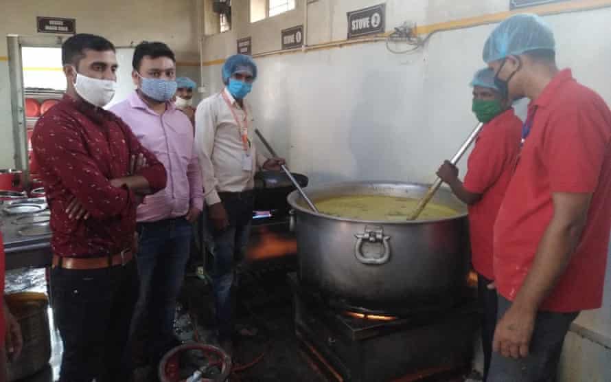 Men take part in cookery session as part of job skills training.