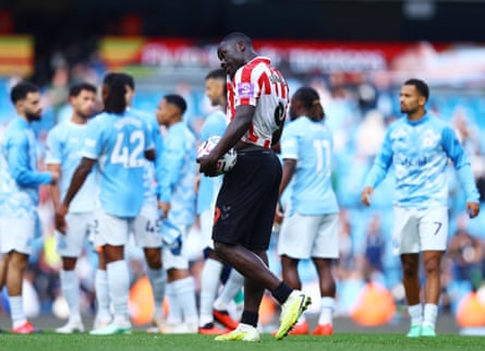 Brian Brobbey holds the match ball but the Sunderland striker looks dejected