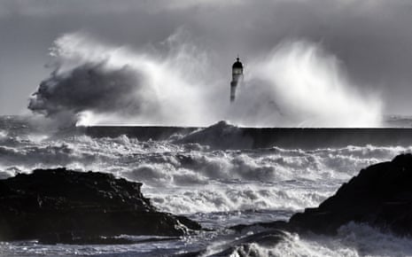 Waves crash over Seaham lighthouse near Durham