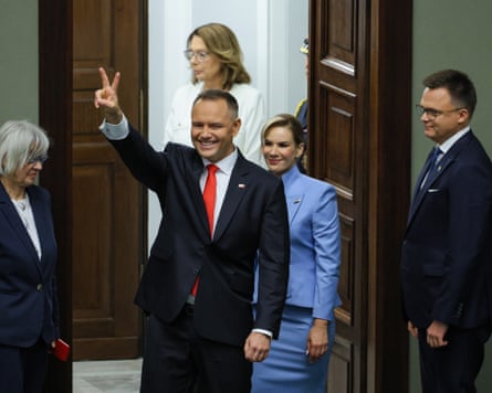 Nawrocki and his wife Marta arrive at parliament before his swearing-in ceremony in Warsaw