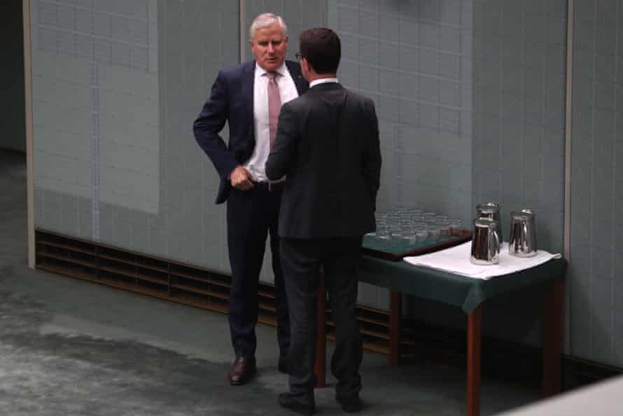 Michael McCormack talks to his new deputy David Littleproud during question time in the house of representatives in Parliament House Canberra this afternoon.