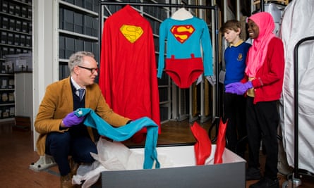Students with an original costume from the 1987 film Superman IV: The Quest for Peace.