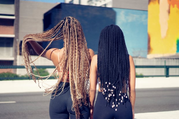 Ketsia Sales and Tatiane Henrique showing her braids