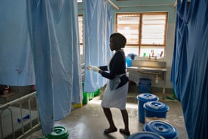 Midwife Dorothy Lenabane helps to deliver a baby in the labour ward of Zomba Central hospital. Unicef is supporting the government of Malawi to improve the survival rates of babies