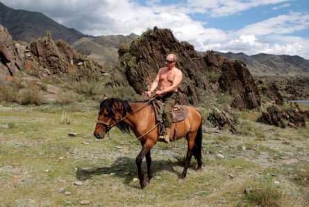 A topless President Putin rides a horse in southern Siberia's Tuva region