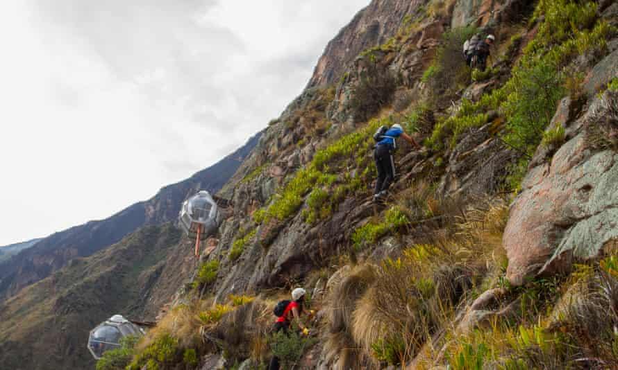 Reaching ‘the world’s first hanging lodge’ involves climbing a via ferrata up the valley.
