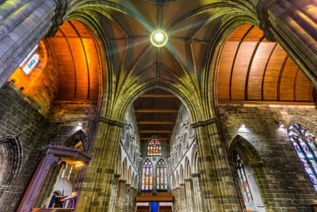 Interior view of Paisley Abbey looking up to the vaulted ceiling.