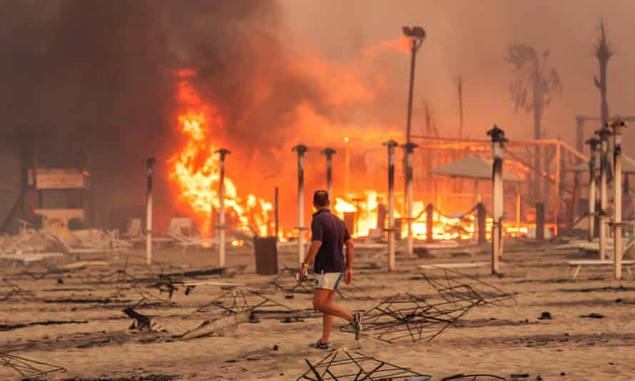Forest fires on Le Capannine beach in Catania, Sicily, on July 30.