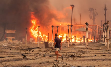 Wildfires at Le Capannine beach in Catania, Sicily, on 30 July.