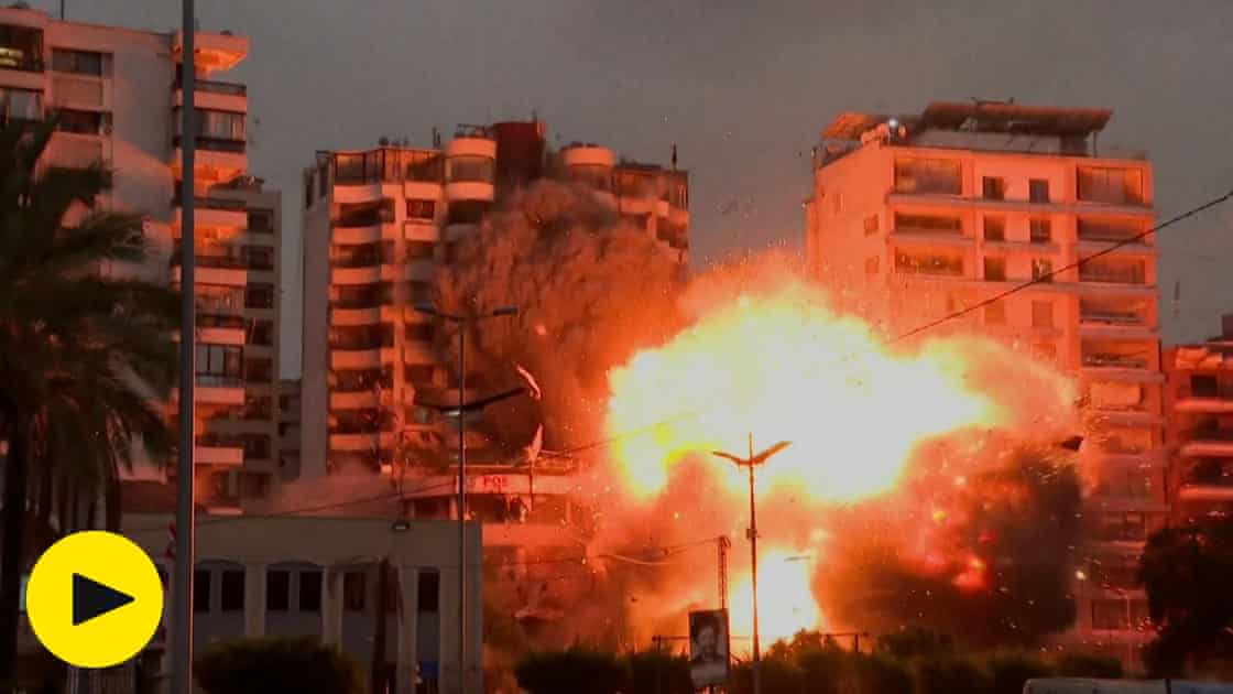 Israeli strike causes huge explosion and rocks building in Beirut – video