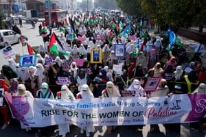 Female supporters of the religious Jamaat-e-Islami party take part in a rally to mark International Women’s Day