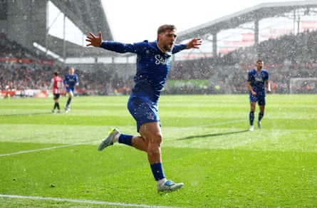 Kiernan Dewsbury-Hall celebrates in the rain at Brentford.