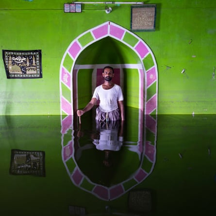 Amjad Ali Laghari in a flooded mosque, Pakistan