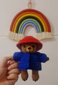 Crochet rainbow, and a crochet bear wearing a Japanese style hat and jacket.