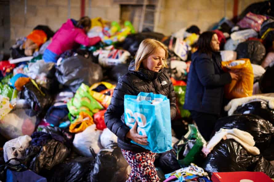 ‘It started with Polish mums’: Yorkshire comes together to help Ukraine | North of England 1 Parcels of food, clothing and toiletries being sorted at a farm at Barwick in Elmet, West Yorkshire, ready for dispatch to refugee camps.
