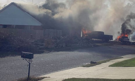 Scene of a US navy training plane crashed in an Alabama residential neighbourhood.