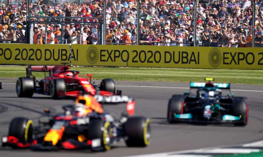 Fans watch the qualifying sprint race for the British GP at Silverstone.