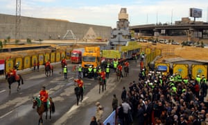 Ramses II statue arrives, with horseback military guard, at the construction site of the Grand Egyptian Museum, Giza, Egypt, on 25 January 2018.