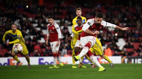 Arsenal’s Olivier Giroud scores their fifth goal from the penalty spot.