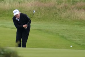 Donald Trump plays a round of golf at his golf course during his visit to the UK