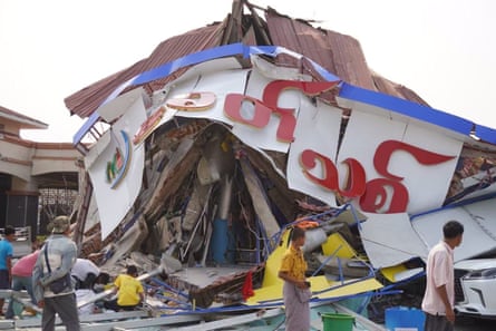 People search through rubble in Naypyidaw, Myanmar’s administrative capital – a city that was only built this century