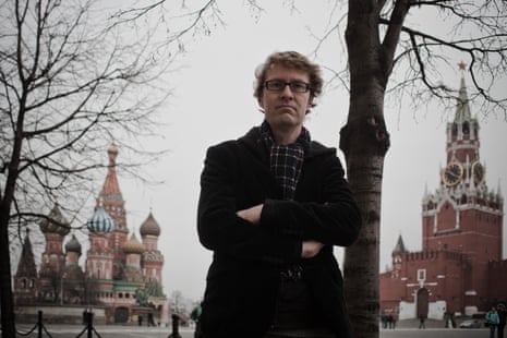 Luke Harding on overcoat and scarf in Red Square, Moscow, Russia on November 2010