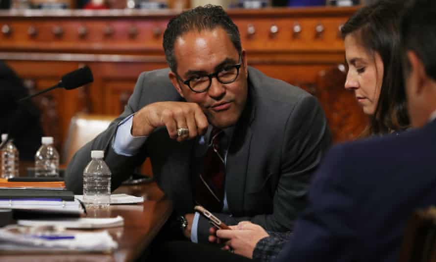 House Intelligence Committee member Rep. Will Hurd (R-TX) consults with fellow Republicans during the first day of public hearing in the impeachment inquiry in the Longworth House Office Building on Capitol Hill November 2019 in Washington, DC. 