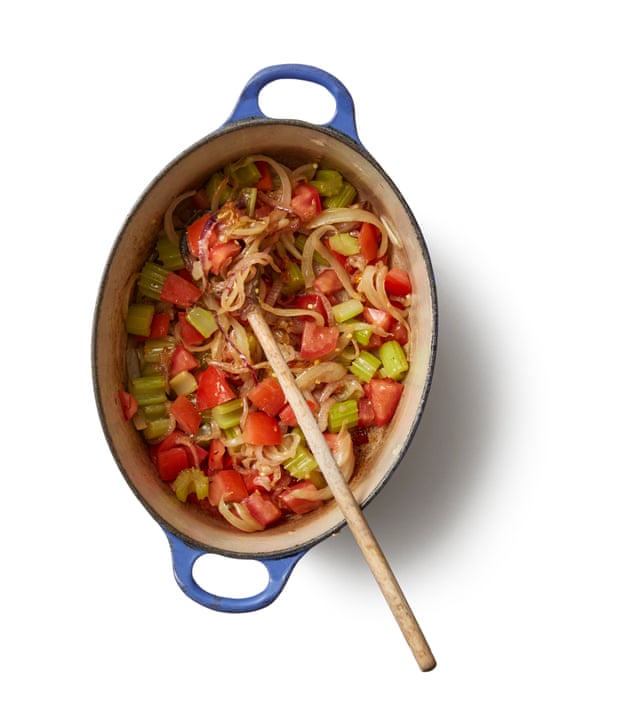 frying onion and celery and then adding tomato in a casserole for Felicity Cloake’s caponata