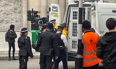 Graham Smith is arrested at Trafalgar Square yesterday.