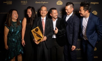 Lifetime Achievement award to winner Shun-Bun Lee with chef Andrew Wong. Observer Food Awards 2022, held at Freemasons Hall, central London. 13 October 2022