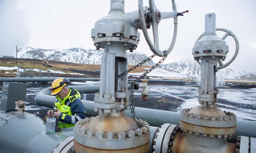 A worker on a CarbFix carbon injection well in Iceland in 201