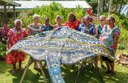 Members of the Ghost Net Collective with one of the rays, from left: Nancy Naawi, Diann Lui, Lavinia Ketchell, Lynnette Griffiths, Jimmy John Thaiday, Florence Gutchen, Marion Gaemers and Racy Oui-Pitt.