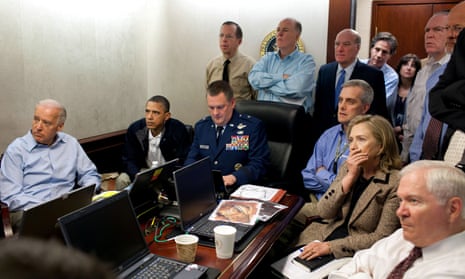 Joe Biden, left, sits alongside Barack Obama and national security advisers as they follow the mission against Osama bin Laden in the White House Situation Room on 1 May 2011.