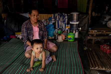 Than Than Soe and her son. She was five months pregnant when troops invaded her village of Lay Kay Kaw in December 2021.