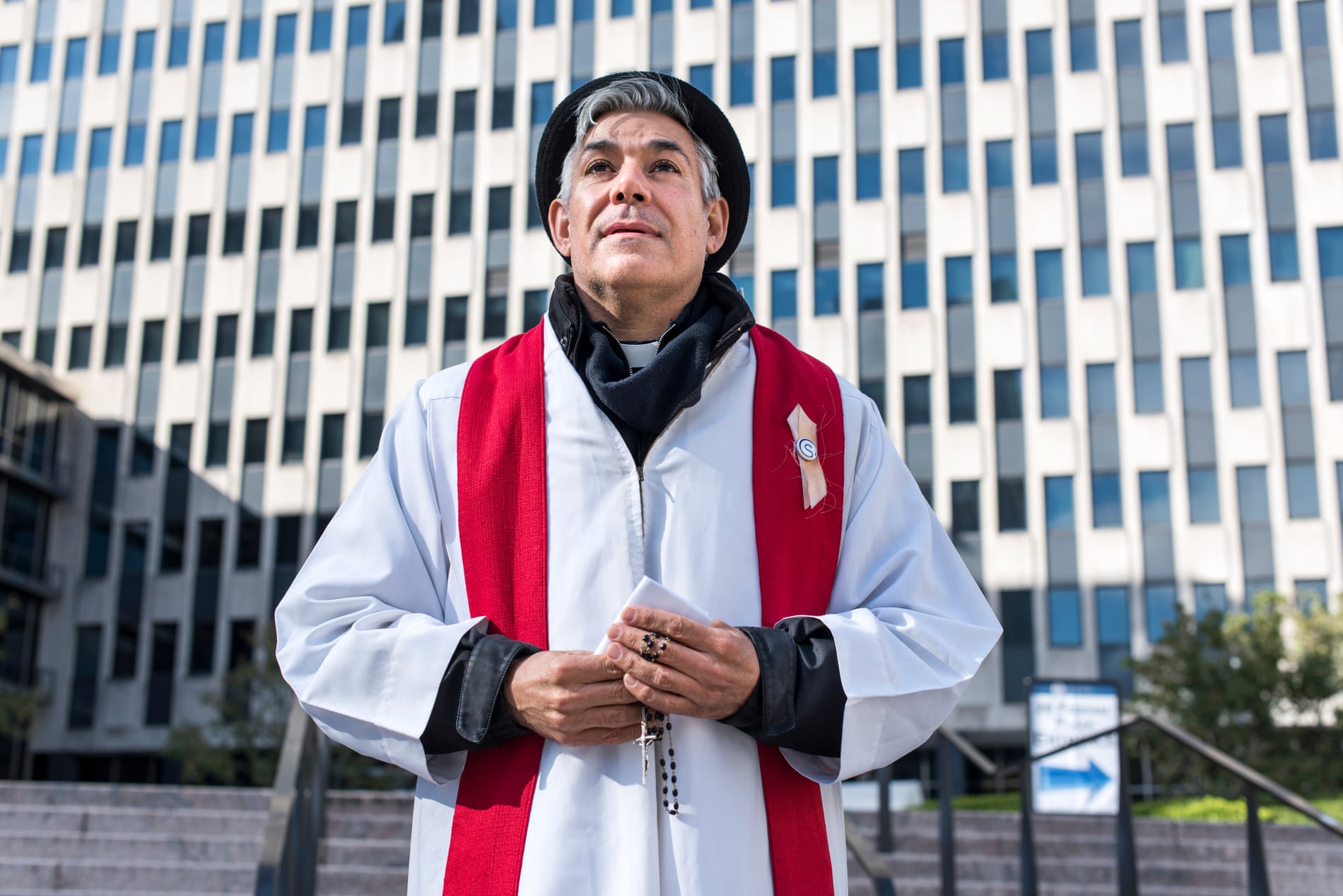 Pastor Fabian Arias of Iglesia de Sion, a Spanish-speaking congregation, leads a Jericho March outside of 26 Federal Plaza.