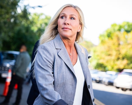 Marjorie Taylor Greene talks with reporters after a meeting at the Capitol Hill Club in September 2025.