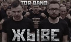 Tor Band album cover – monochrome image of two sombre-looking band members wearing black T-shirts and standing in front of large crowd waving fists