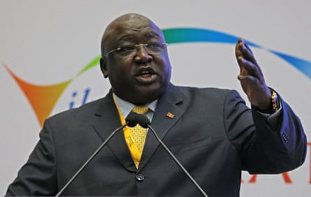 Oryem Okello speaking into a microphone