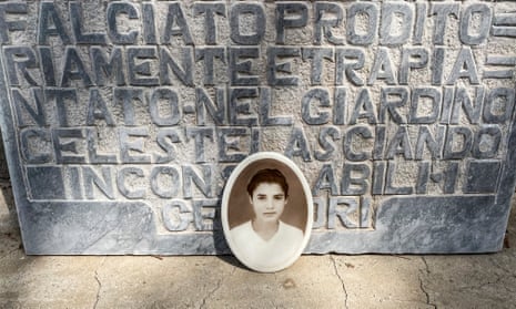 A picture of Lucia Mantione by her tombstone in Montedoro’s cemetery